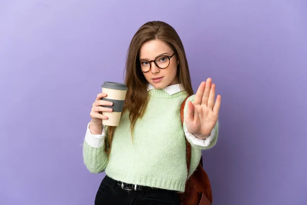 Teenager Student Dívka Přes Izolované Fialové Pozadí Dělat Stop Gesto — Stock fotografie