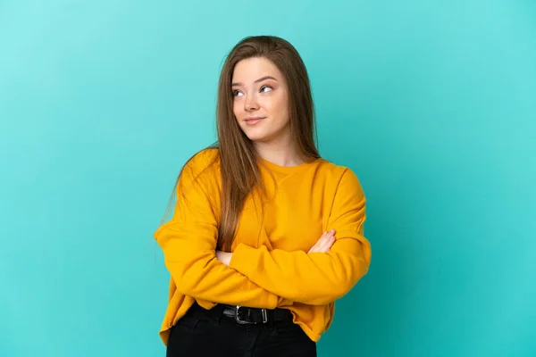 Adolescente Chica Sobre Aislado Azul Fondo Haciendo Dudas Gesto Mientras — Foto de Stock