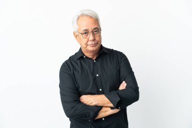 Middle age Brazilian man isolated on white background feeling upset