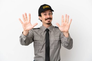 Young caucasian security man isolated on white background counting ten with fingers