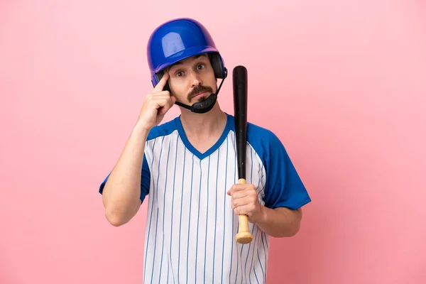 Young Caucasian Man Playing Baseball Isolated Pink Background Thinking Idea — Stok fotoğraf