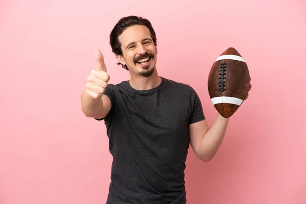 Young Caucasian Man Playing Rugby Isolated Pink Background Thumbs Because – stockfoto