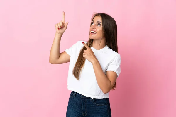 Young Uruguayan Woman Isolated Pink Background Pointing Index Finger Great — Stock Fotó