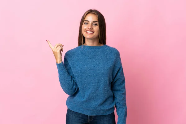 Young Uruguayan Woman Isolated Pink Background Showing Lifting Finger Sign — Foto de Stock