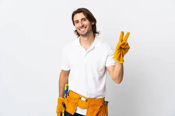 Jeune Électricien Homme Sur Fond Isolé Souriant Montrant Signe Victoire — Photo