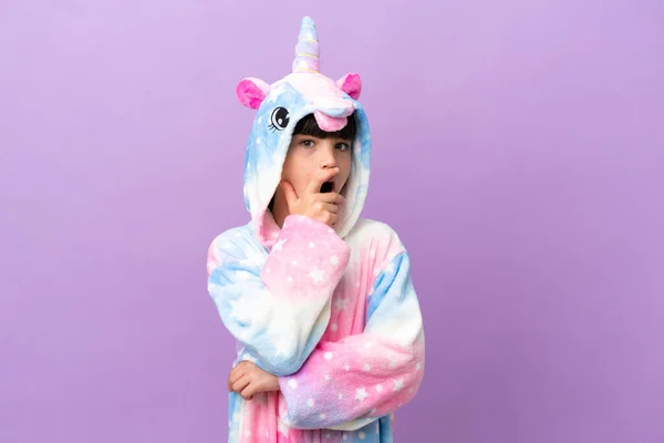 Little Kid Wearing Unicorn Pajama Isolated Purple Background Surprised Shocked — Stock Photo, Image