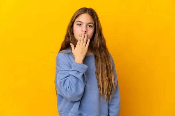 Child Isolated Yellow Background Covering Mouth Hand — Stock Photo, Image