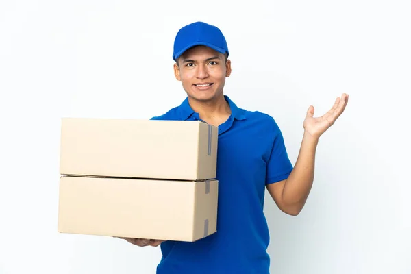 Delivery Ecuadorian Man Isolated White Background Extending Hands Side Inviting — Stockfoto