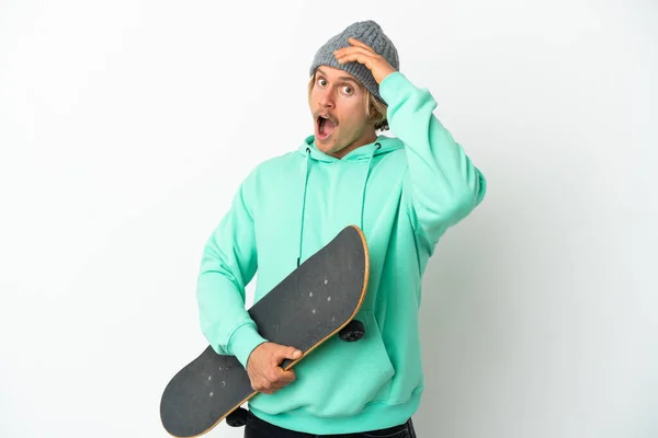 Young Skater Blonde Man Isolated White Background Doing Surprise Gesture — Zdjęcie stockowe