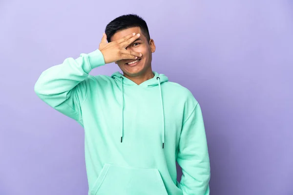 Young Ecuadorian Man Isolated Purple Background Covering Eyes Hands Smiling — Photo