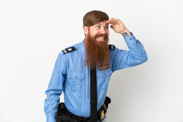 Redhead Police Man Isolated White Background Looking Far Away Hand — Stockfoto