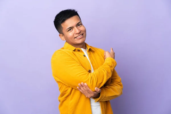 Young Ecuadorian Man Isolated Purple Background Pointing Back — Stock Fotó