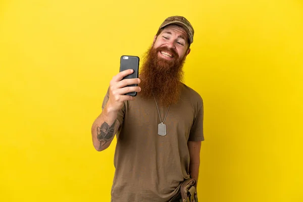 Redhead Military Man Dog Tag Isolated Yellow Background Making Selfie — Stock fotografie