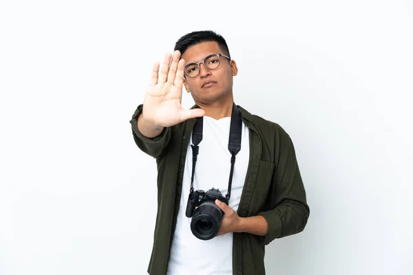 Young Ecuadorian Photographer Isolated White Background Making Stop Gesture — Φωτογραφία Αρχείου