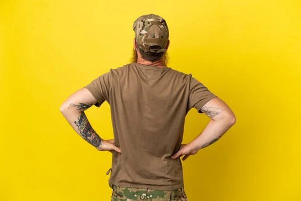 Redhead Military Man Dog Tag Isolated Yellow Background Back Position — Stockfoto