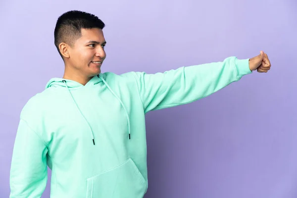 Young Ecuadorian Man Isolated Purple Background Giving Thumbs Gesture — Foto de Stock