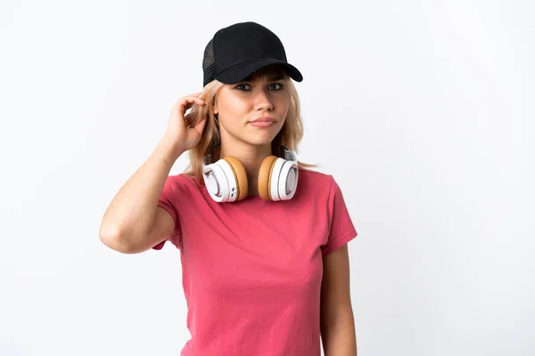 Jong Russisch Vrouw Luisteren Muziek Geïsoleerd Witte Achtergrond Met Twijfels — Stockfoto