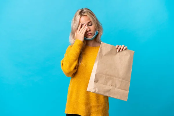 Young Russian Woman Holding Grocery Shopping Bag Isolated Blue Background — Stock Photo, Image