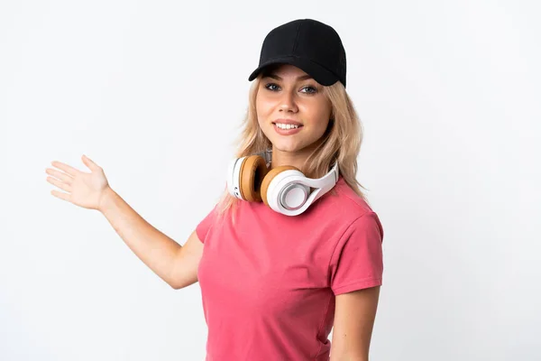 Young Russian Woman Listening Music Isolated White Background Extending Hands — Stock Photo, Image