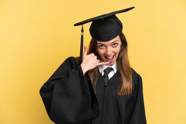 Young University Graduate Isolated Yellow Background Making Phone Gesture Call —  Fotos de Stock