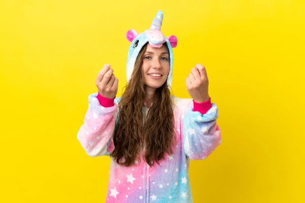 Girl Unicorn Pajamas Isolated Background Making Money Gesture — Stock Photo, Image