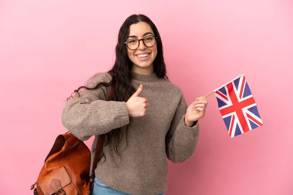 Joven Mujer Caucásica Sosteniendo Una Bandera Del Reino Unido Aislada — Foto de Stock