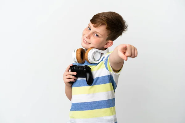 Little Redhead Boy Holding Game Pad Isolated White Background Pointing — Stock Photo, Image