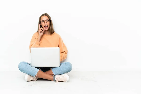 Young Woman Laptop Sitting Floor Intending Realizes Solution While Lifting — Stock Photo, Image