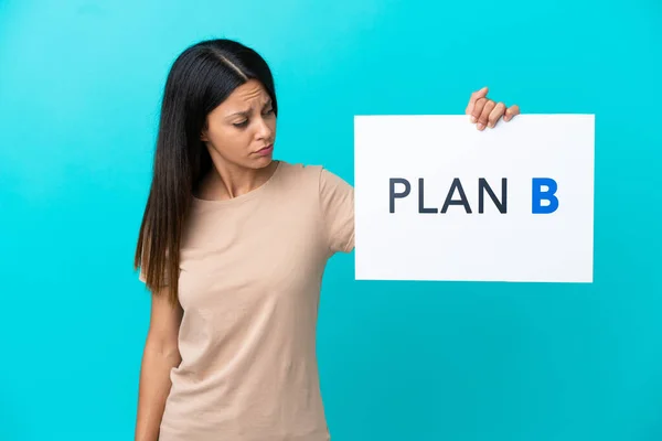 Young Woman Isolated Background Holding Placard Message Plan Sad Expression — Stock Photo, Image