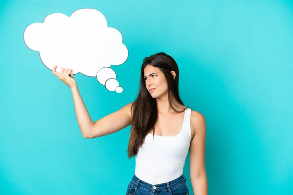 Young Brazilian Woman Isolated Blue Background Holding Thinking Speech Bubble — Stock Photo, Image