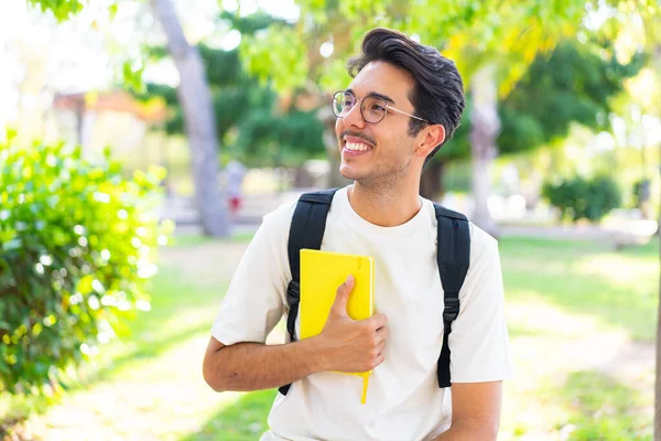 Young Student Man Outdoors Holding Notebook Happy Expression — Stock Photo, Image