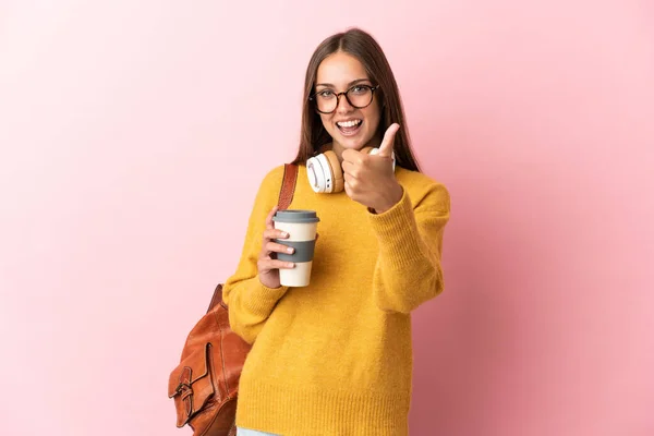 Joven Estudiante Sobre Fondo Rosa Aislado Con Pulgares Hacia Arriba —  Fotos de Stock