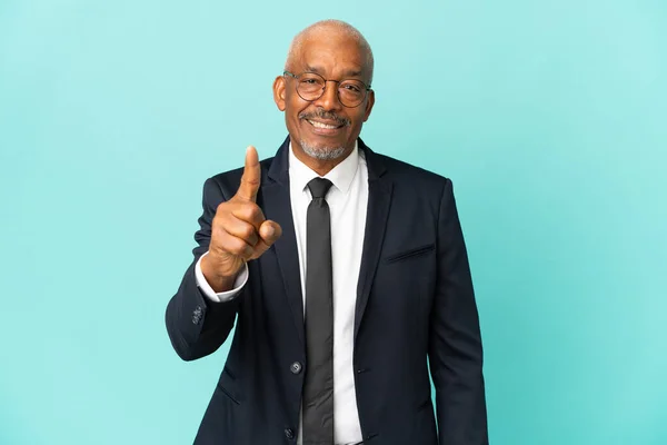 Business Senior Man Isolated Blue Background Showing Lifting Finger — Stock Photo, Image