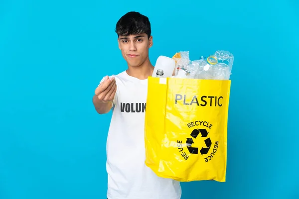 Holding Bag Full Plastic Bottles Recycle Blue Background Making Money — Stock Photo, Image