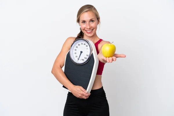 Young English Woman Isolated White Background Holding Weighing Machine Offering — Stock Photo, Image