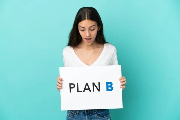 Young French Woman Isolated Blue Background Holding Placard Message Plan — Stock Photo, Image