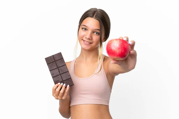 Malá Běloška Izolované Bílém Pozadí Čokoládovou Tabletu Jedné Ruce Jablko — Stock fotografie