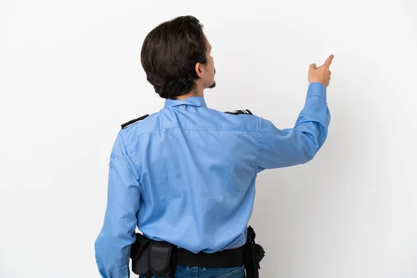 Young Police Man Isolated Background White Pointing Back Index Finger Stock Picture