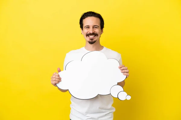 Young Caucasian Man Isolated Yellow Background Holding Thinking Speech Bubble — Stock Photo, Image