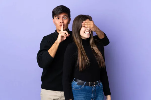 Young Couple Isolated Purple Background Covering Her Eyes Surprise Her — Stock Photo, Image