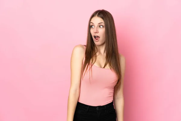 Young Caucasian Woman Isolated Pink Background Doing Surprise Gesture While — Stock Photo, Image