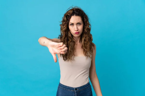 Young Caucasian Woman Isolated Blue Background Showing Thumb Negative Expression — Stock Photo, Image