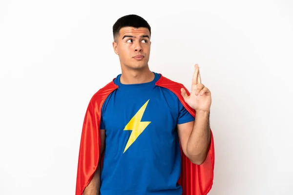 Super Hero Isolated White Background Fingers Crossing Wishing Best — Stock Photo, Image