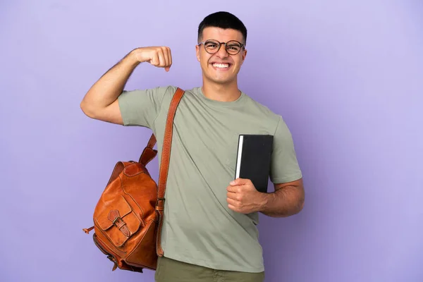 Guapo Estudiante Hombre Sobre Aislado Fondo Haciendo Fuerte Gesto — Foto de Stock