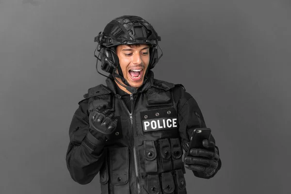 Swat Caucasian Man Isolated Grey Background Phone Victory Position — Stock Photo, Image