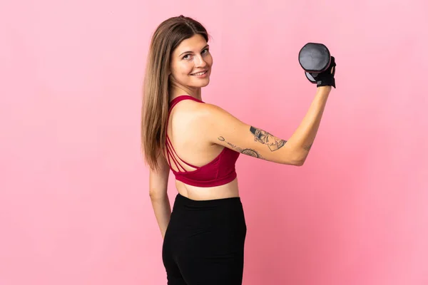 Jovem Mulher Eslovaca Isolado Fundo Rosa Fazendo Levantamento Peso — Fotografia de Stock