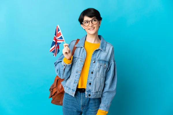 Žena Držící Britskou Vlajku Nad Izolovaným Pozadím Přemýšlející Nápadu Při — Stock fotografie