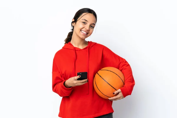 Young Woman Playing Basketball Isolated White Background Sending Message Mobile — Stock Photo, Image