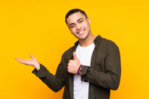 Asian Handsome Man Isolated Yellow Background Showing Sign Two Hands — Stock Photo, Image