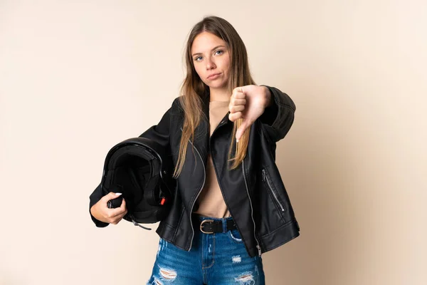 Young Lithuanian Woman Holding Motorcycle Helmet Isolated Beige Background Showing — Stock Photo, Image